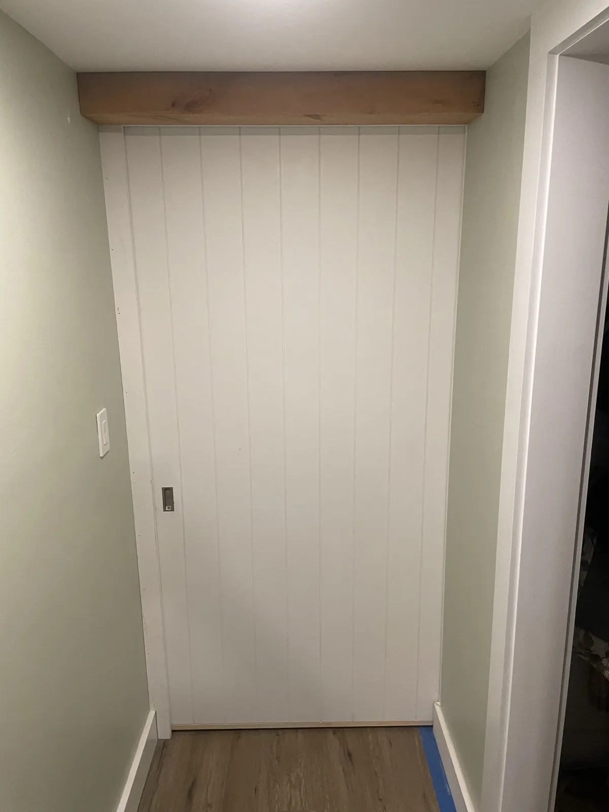 Custom side-mount sliding barn door installed in Topsham, Maine